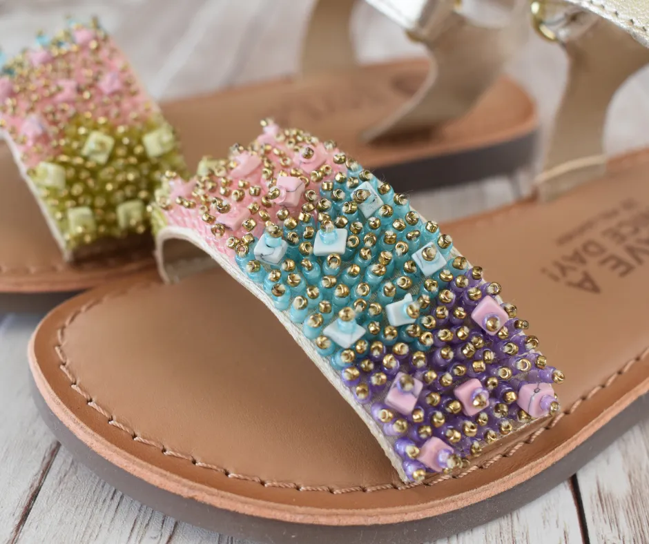 Golden leather sandals with multicolr beads.Gioseppo